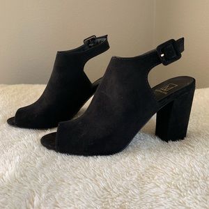 Black faux leather heels